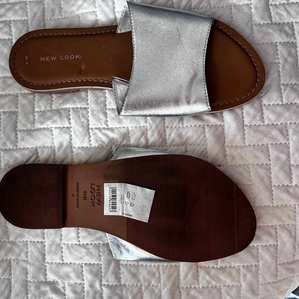 Slide sandals great for summer. Silver and goes with everything.